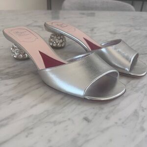 Roger Vivier metallic leather jewel heeled mules.